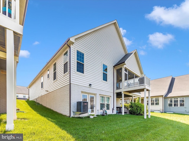 3218 Thornapple Dr, Frederick, MD 21704 - back of house with central AC, a yard, and brick siding