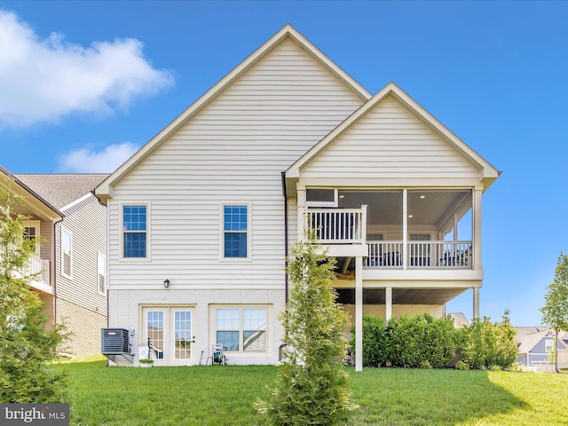 3218 Thornapple Dr, Frederick, MD 21704 - back of property with a yard, central AC unit, and brick siding