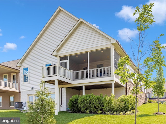 3218 Thornapple Dr, Frederick, MD 21704 - rear view of house with central AC, a sunroom, and a yard