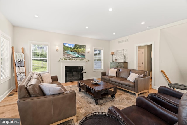 1413 Cortez Rd, Blue Bell, PA 19422 - living area featuring light wood finished floors, baseboards, a glass covered fireplace, and recessed lighting