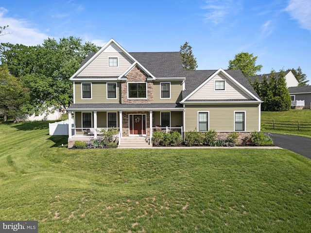 1413 Cortez Rd, Blue Bell, PA 19422 - view of front of home featuring stone siding, a porch, and roof with shingles