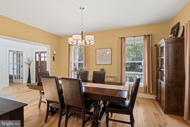 1413 Cortez Rd, Blue Bell, PA 19422 - dining area with a chandelier, light wood-style floors, and baseboards