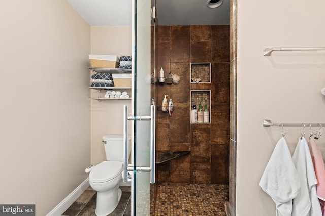 1413 Cortez Rd, Blue Bell, PA 19422 - full bath featuring a shower stall, toilet, baseboards, and tile patterned floors