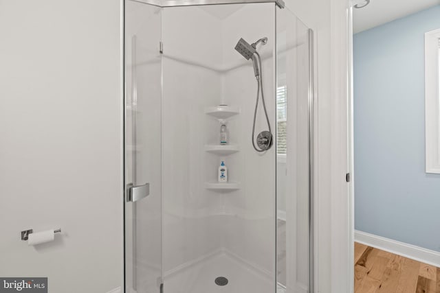 1413 Cortez Rd, Blue Bell, PA 19422 - bathroom featuring a stall shower, wood finished floors, and baseboards