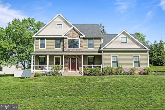 1413 Cortez Rd, Blue Bell, PA 19422 - view of front of home featuring stone siding, a porch, and a front lawn