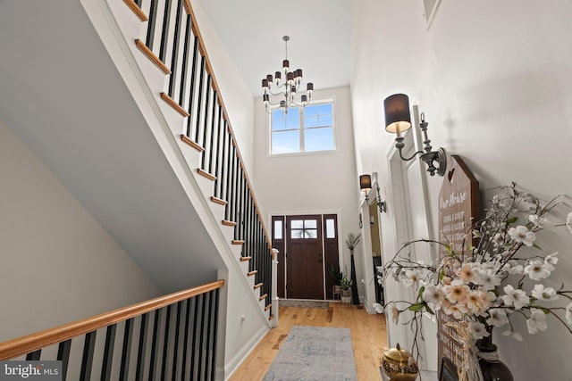 1413 Cortez Rd, Blue Bell, PA 19422 - foyer with stairs, a chandelier, wood finished floors, and a towering ceiling