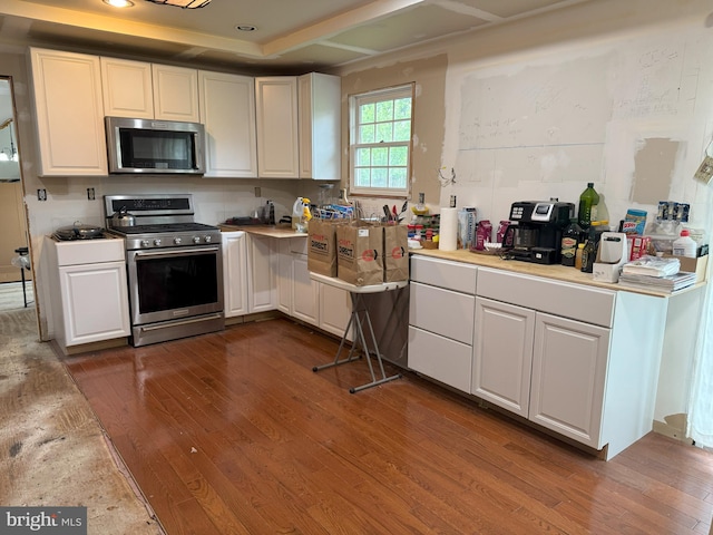 801 Irenic Ct, Norristown, PA 19403 - kitchen with appliances with stainless steel finishes, dark wood-type flooring, white cabinets, and light countertops