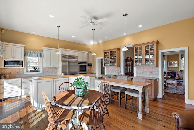 55 The Strand, New Castle, DE 19720 - dining room featuring hardwood / wood-style floors, ceiling fan, and recessed lighting