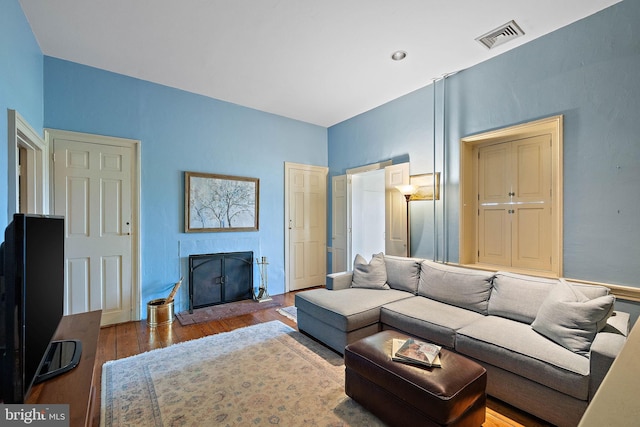 55 The Strand, New Castle, DE 19720 - living area featuring a fireplace and hardwood / wood-style floors