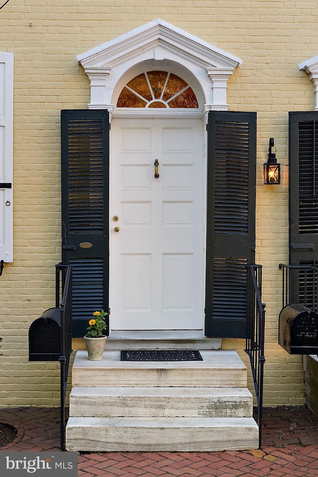55 The Strand, New Castle, DE 19720 - property entrance featuring brick siding