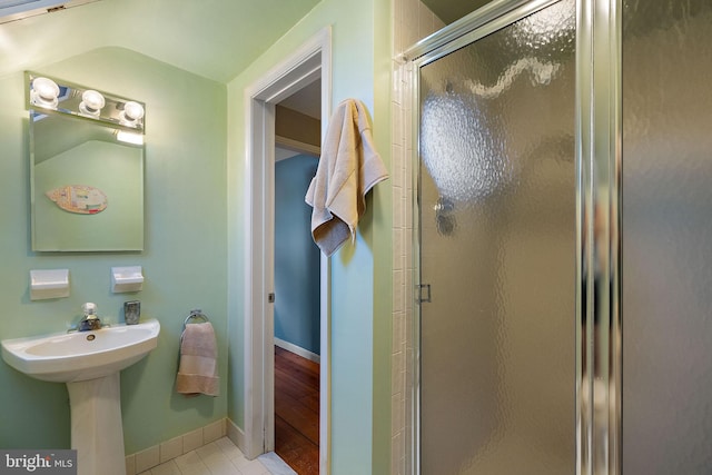 55 The Strand, New Castle, DE 19720 - full bath with a shower stall, tile patterned floors, baseboards, and a sink