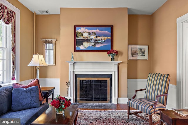 55 The Strand, New Castle, DE 19720 - living area featuring a fireplace with flush hearth and wood finished floors