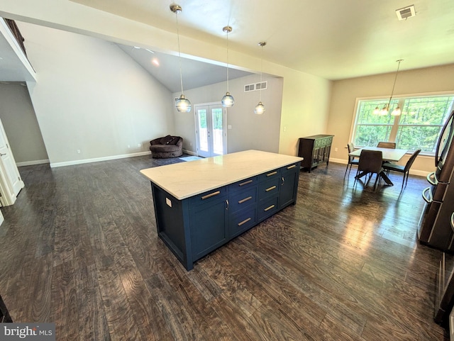 130 Corktree Rd, Kunkletown, PA 18058 - kitchen featuring dark wood-type flooring, blue cabinets, lofted ceiling, refrigerator, and baseboards