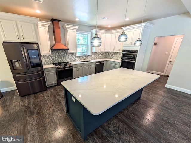 130 Corktree Rd, Kunkletown, PA 18058 - kitchen with appliances with stainless steel finishes, wall chimney exhaust hood, a sink, baseboards, and recessed lighting