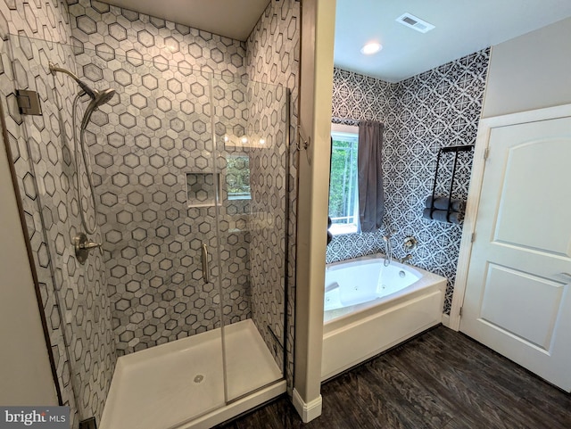 130 Corktree Rd, Kunkletown, PA 18058 - bathroom featuring tiled shower, wood finished floors, and a bath