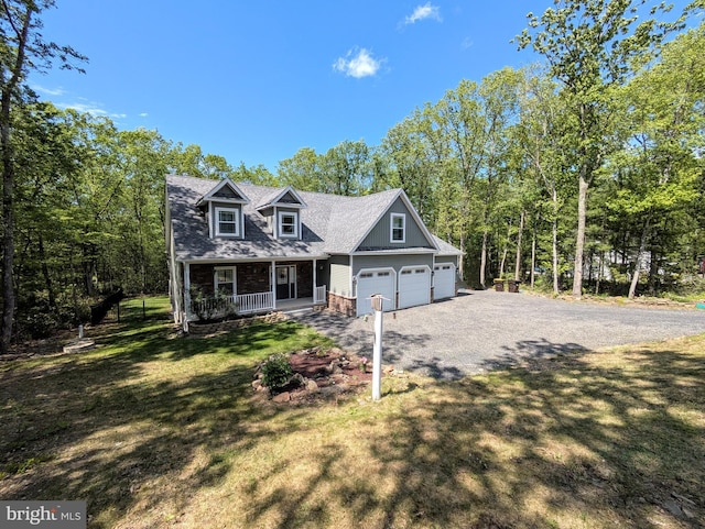 130 Corktree Rd, Kunkletown, PA 18058 - cape cod-style house featuring covered porch, gravel driveway, and a front lawn