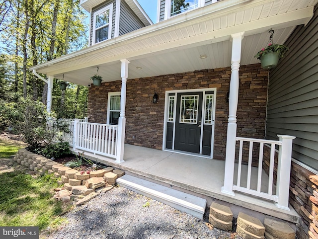 130 Corktree Rd, Kunkletown, PA 18058 - property entrance with a porch and stone siding