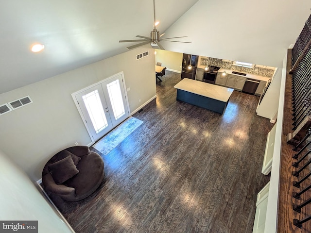 130 Corktree Rd, Kunkletown, PA 18058 - living area featuring french doors, a ceiling fan, dark wood-style floors, lofted ceiling, and baseboards
