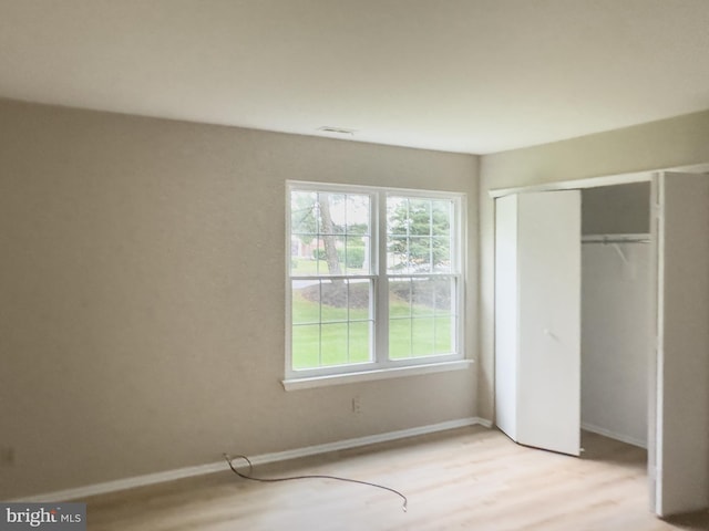 5807 Adelaide Dr, Mount Laurel, NJ 08054 - unfurnished bedroom featuring light wood-style floors, a closet, and baseboards