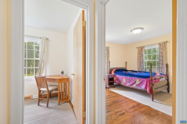 150 N Bennington Rd, Charlottesville, VA 22901 - bedroom featuring wood finished floors, baseboards, and a desk