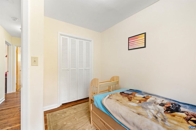 150 N Bennington Rd, Charlottesville, VA 22901 - bedroom featuring light wood-style flooring, baseboards, and a closet