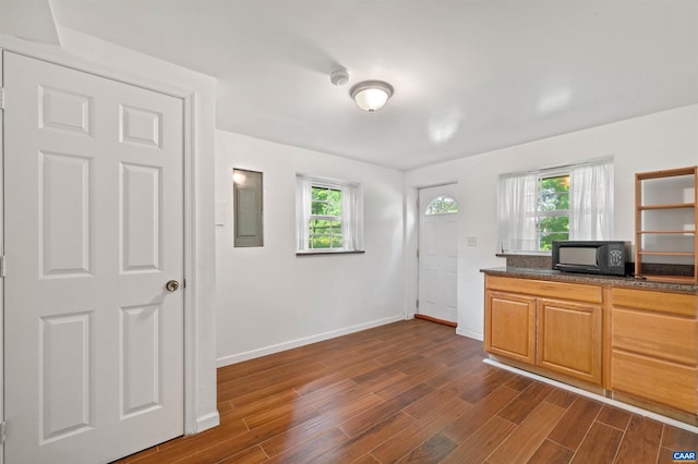 150 N Bennington Rd, Charlottesville, VA 22901 - kitchen featuring black microwave, electric panel, dark wood-type flooring, and baseboards