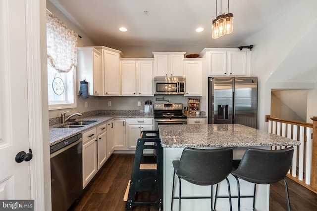 104 Overlook Dr, Hanover, PA 17331 - kitchen featuring appliances with stainless steel finishes, a sink, dark wood-type flooring, white cabinetry, and recessed lighting