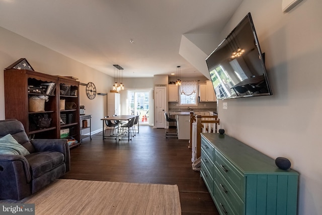 104 Overlook Dr, Hanover, PA 17331 - living area with dark wood-type flooring, a chandelier, and an AC wall unit