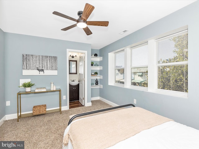 5443 Jonquil Ave, Baltimore, MD 21215 - bedroom with carpet flooring, baseboards, a sink, and ceiling fan