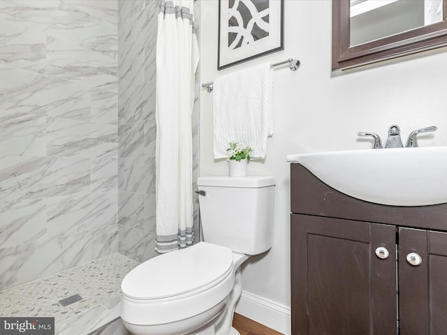5443 Jonquil Ave, Baltimore, MD 21215 - full bath featuring a shower stall, toilet, and vanity