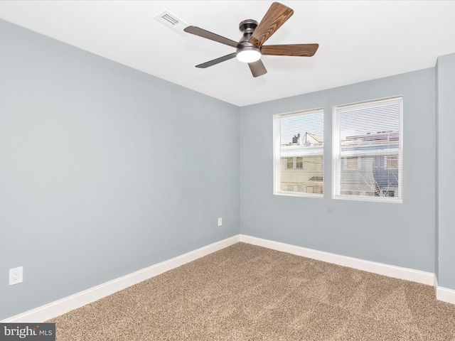 5443 Jonquil Ave, Baltimore, MD 21215 - spare room with carpet flooring, baseboards, and a ceiling fan