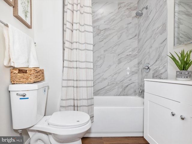 5443 Jonquil Ave, Baltimore, MD 21215 - bathroom featuring toilet, shower / bathtub combination with curtain, wood finished floors, and vanity
