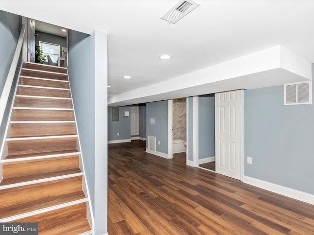 5443 Jonquil Ave, Baltimore, MD 21215 - stairway featuring baseboards, wood finished floors, and recessed lighting