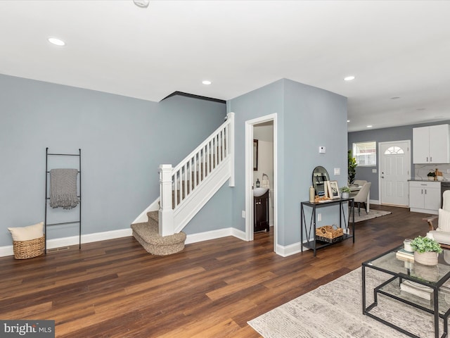 5443 Jonquil Ave, Baltimore, MD 21215 - living area featuring stairway, wood finished floors, baseboards, and recessed lighting