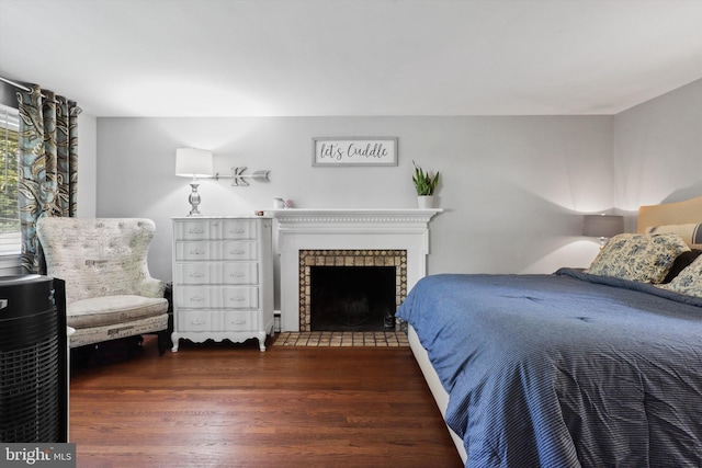 10317 Beaumont St, Fairfax, VA 22030 - bedroom with wood finished floors and a fireplace