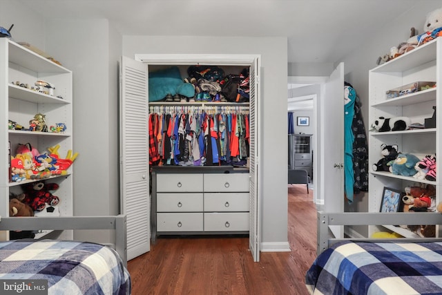 10317 Beaumont St, Fairfax, VA 22030 - bedroom featuring dark wood-style flooring and a closet