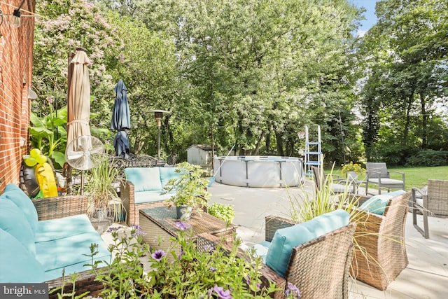 10317 Beaumont St, Fairfax, VA 22030 - view of patio / terrace with outdoor lounge area and a jacuzzi