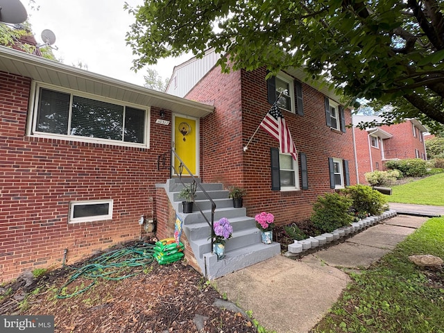 10317 Beaumont St, Fairfax, VA 22030 - view of front of home featuring brick siding and entry steps