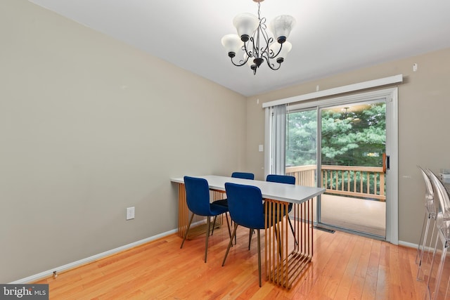 12220 Apple Orchard Ct, Fairfax, VA 22033 - dining space featuring a chandelier, light wood-style floors, and baseboards