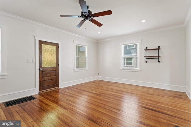 unfurnished room with wood-type flooring, ornamental molding, baseboards, ceiling fan, and recessed lighting