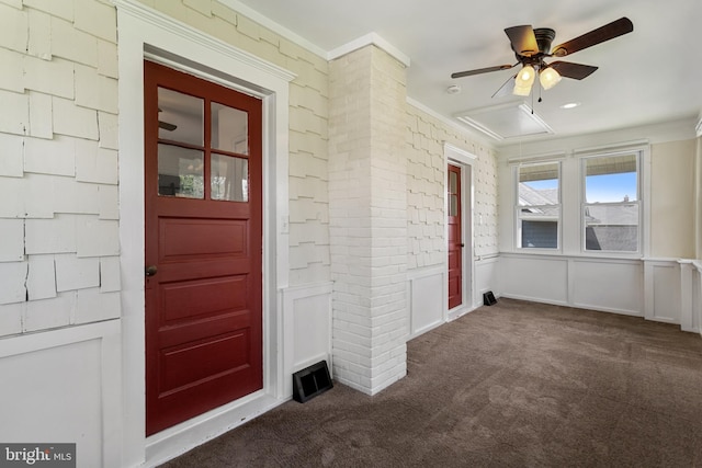 view of exterior entry featuring ceiling fan