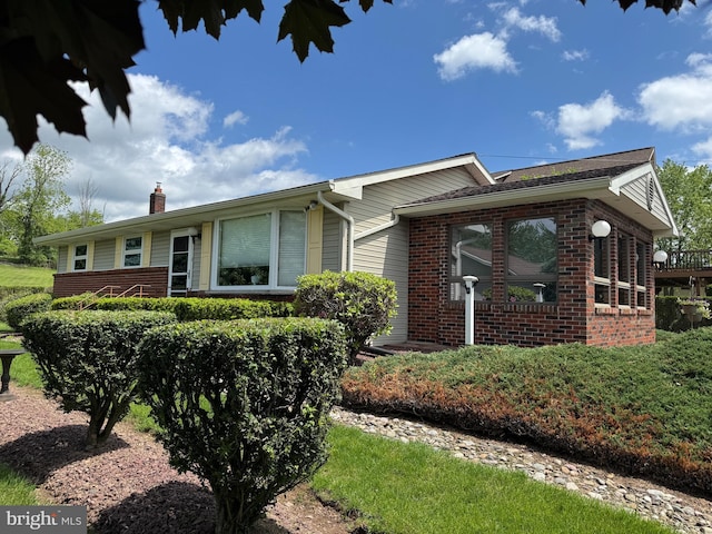 1472 Bearcat Cv, Auburn, PA 17922 - ranch-style house with brick siding and a chimney