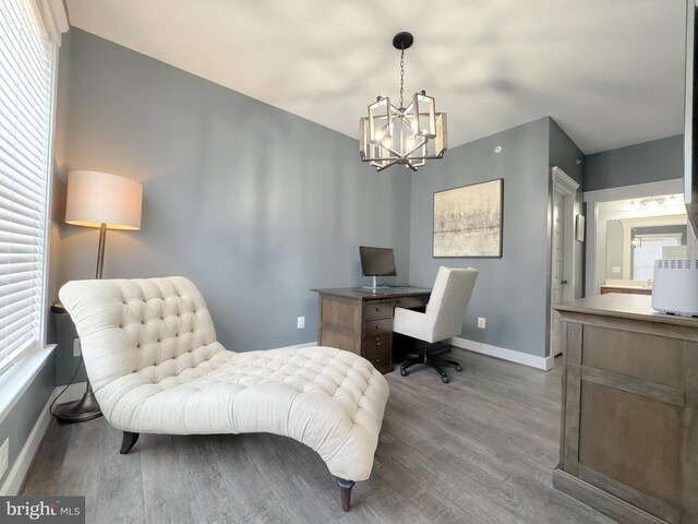 18030 Stump St, Dumfries, VA 22026 - home office with baseboards, a chandelier, wood finished floors, and plenty of natural light