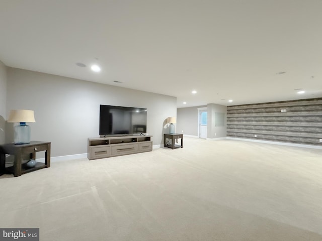 18030 Stump St, Dumfries, VA 22026 - unfurnished living room with baseboards, light colored carpet, and recessed lighting