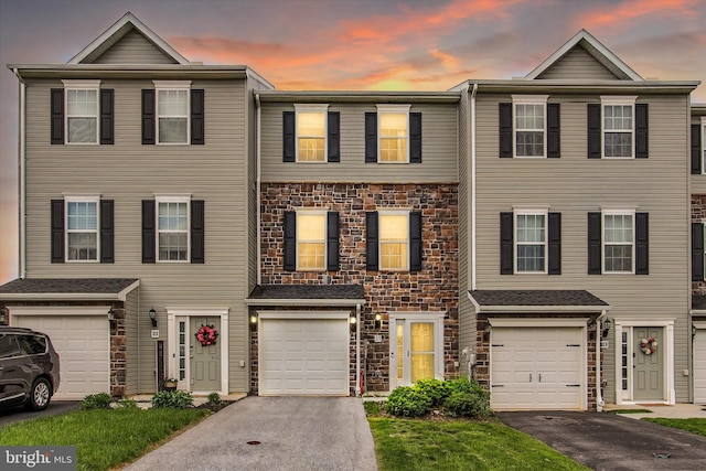 31 Holstein Dr, Hanover, PA 17331 - multi unit property with a garage, driveway, and stone siding