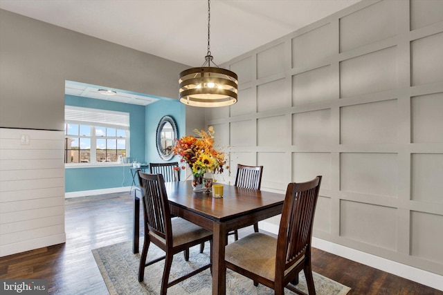 31 Holstein Dr, Hanover, PA 17331 - dining space featuring a decorative wall, dark wood finished floors, a chandelier, baseboards, and built in features