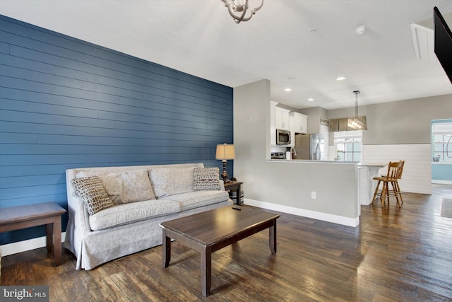31 Holstein Dr, Hanover, PA 17331 - living area with baseboards, dark wood-style flooring, wood walls, and recessed lighting