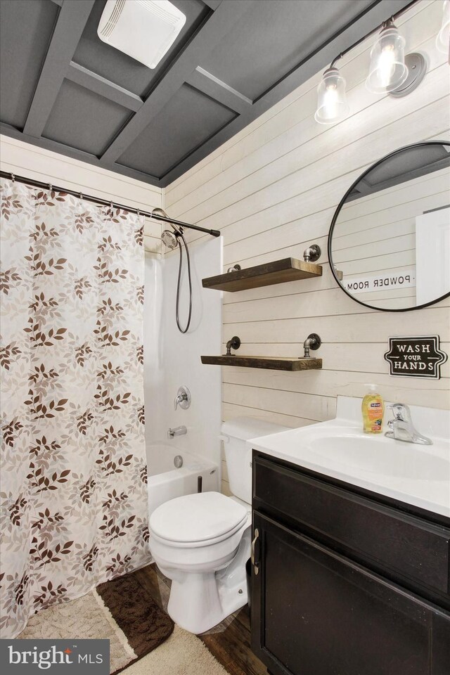 31 Holstein Dr, Hanover, PA 17331 - bathroom featuring vanity, toilet, wood walls, and shower / tub combo