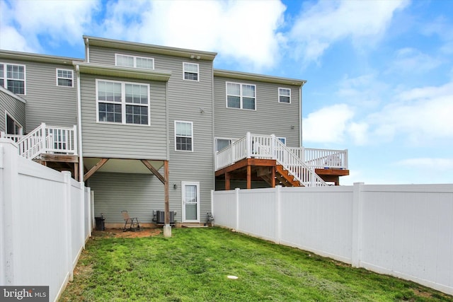 31 Holstein Dr, Hanover, PA 17331 - back of property featuring stairway, central AC unit, and a deck