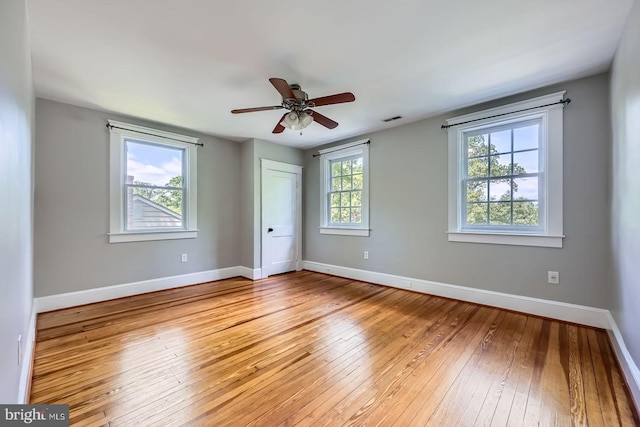 818 Glen Allen Dr, Baltimore, MD 21229 - unfurnished bedroom with light wood finished floors, baseboards, a closet, and a ceiling fan